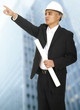 Architect Pointing With Building Background Architect Pointing With Building Background