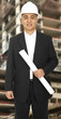 Designer Holding Floor Plan Designer Holding Floor Plan