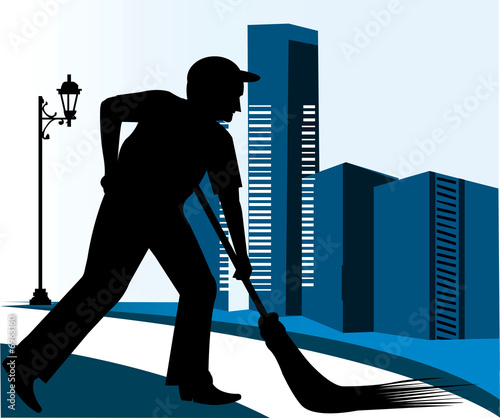 Photo: silhouette of a man cleaning the road silhouette of a man cleaning the road