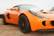 Artistic blur of orange motor car. Artistic blur of orange motor car.