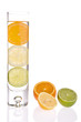 Lemon,orange and lime in glass of water