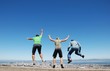 Happy young boys jumping