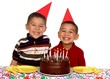 Children at a Birthday Party with Chocolate Cake