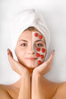 Beautiful woman with fruit mask on her face Beautiful woman with fruit mask on her face