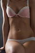 Beautiful underwear fashion model sitting down