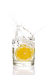 Lemon splashing in water