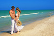 happy, attractive couple at the beach happy, attractive couple at the beach