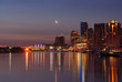 downtown vancouver at dawn with crescent moon