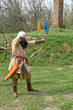 a medieval archer acting during an italian fair