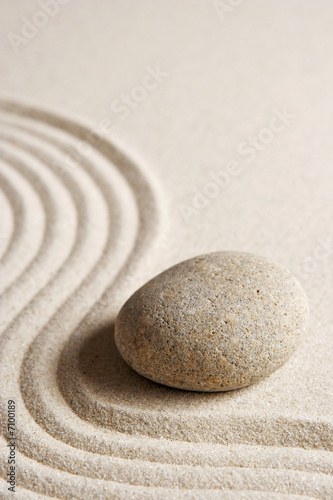 Stone on raked sand