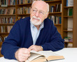 Thoughtful Senior in Library
