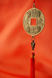 Oriental medallion on the red silk background