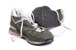 Old grungy Running Shoes isolated on white background