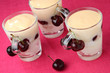 Cherry mascarpone cream in glass cup with fresh cherries Cherry mascarpone cream in glass cup with fresh cherries