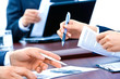 Hands of business people