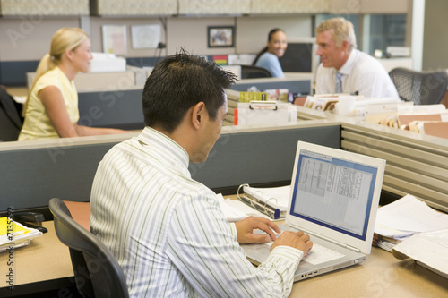 Photo: Group of worker in open plan office Group of worker in open plan office