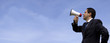 Businessman speaking with a megaphone