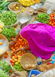 Indian lady in Sari surrounded by food