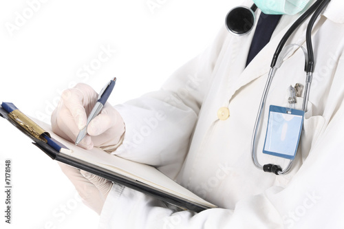 Photo: doctor holding a folder of information doctor holding a folder of information