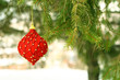 Red christmas ball in a tree