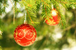 Two christmas balls in a tree