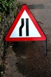 road narrows sign