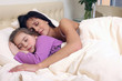 Mother and daughter sleeping
