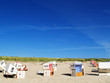 canvas print picture Leere Strankörbe am Sylter Strand
