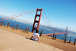 Young boy looks at the Golden Gate Bridge