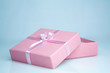 box gift with a pink ribbon