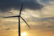 single wind turbine at sunset