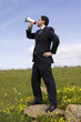 Businessman speaking with a megaphone