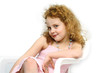 Girl 6 years old sit  like a princess and smile
