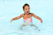 Photo: Happy young girl in a pool Happy young girl in a pool