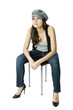 Young adult sitting on a stool