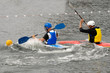 People are playing kayak polo