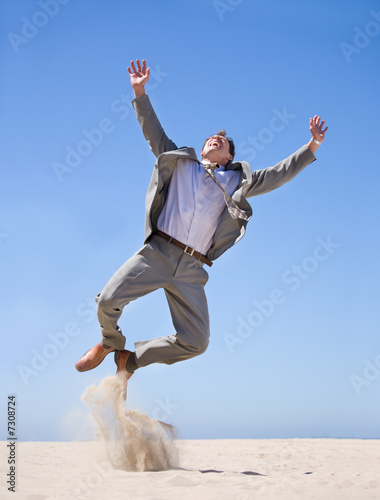 Photo: Businessman jumping in air, great success Businessman jumping in air, great success