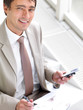 Business man working on laptop and mobile phone