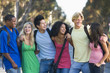 Photo: Group of young friends chatting outside Group of young friends chatting outside