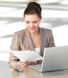 Business woman looking at paperwork