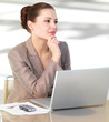 Young businesswoman thinking
