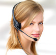 Photo: Beautiful young woman with headset Beautiful young woman with headset