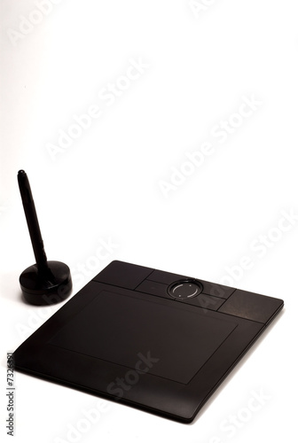 Photo: graphic tablet and pen on white background graphic tablet and pen on white background