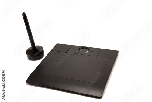 Photo: graphic tablet and pen on white background graphic tablet and pen on white background
