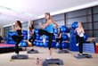 girls stepping in a fitness center girls stepping in a fitness center