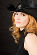 sexy redhead woman in black hat