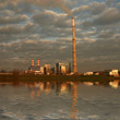 Powerplant with cloudy sky and reflection in river Powerplant with cloudy sky and reflection in river