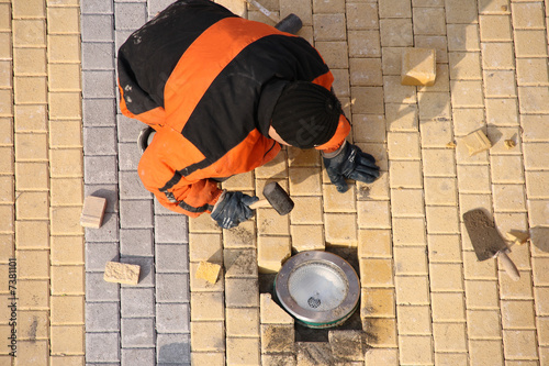 Photo: Road worker making pavement Road worker making pavement