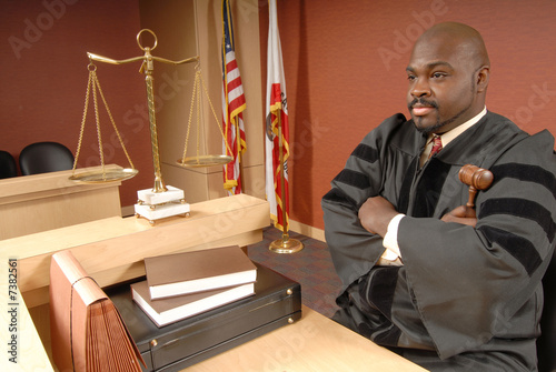 Photo: Judge in his courtroom Judge in his courtroom