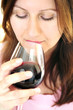 Mature woman with a glass of red wine